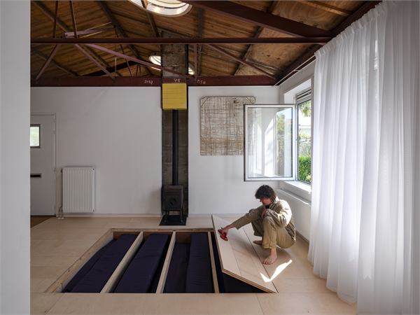 Image 4: the bed beneath the floor hatch.